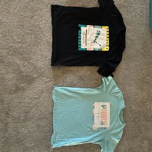 2 puma graphic shirts